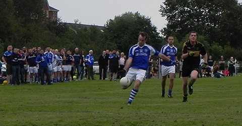 Sean Roddy kicks the ball in a match