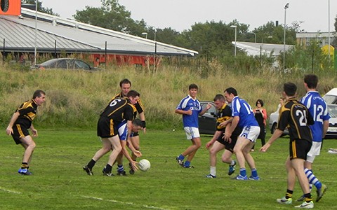 Two gaelic teams fight for the ball