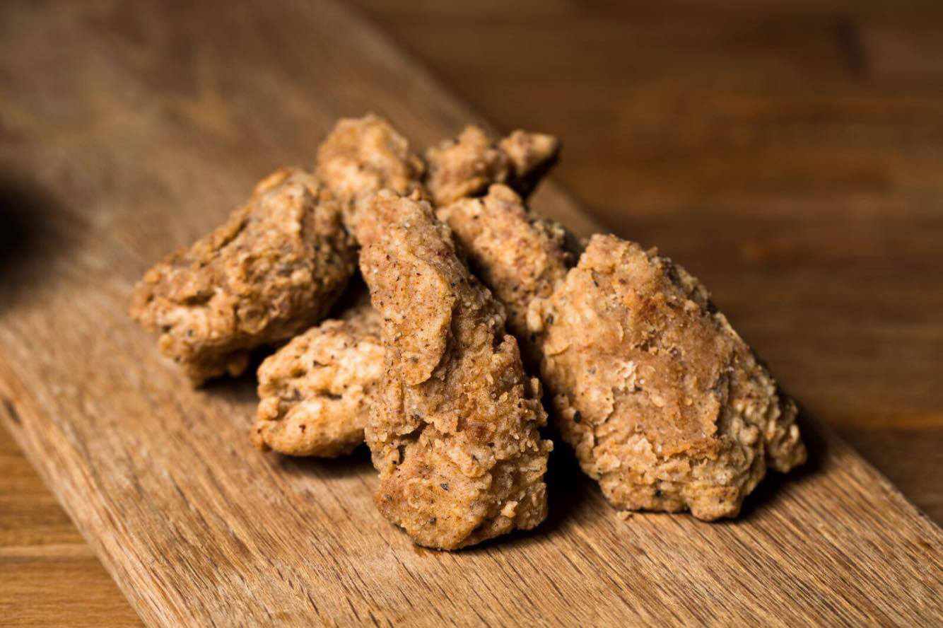 photo of vegan junk food style southern fried chicken 
