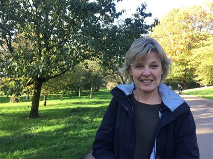 woman in park on a sunny autumn day