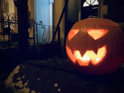 Jack o' Lantern outside a house