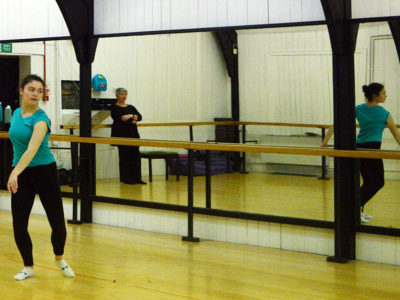 Rubicon Dance student dances in their studio on Nora street