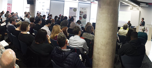 Attendees sitting at a workshop