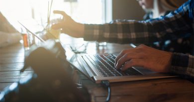 A young person using a laptop